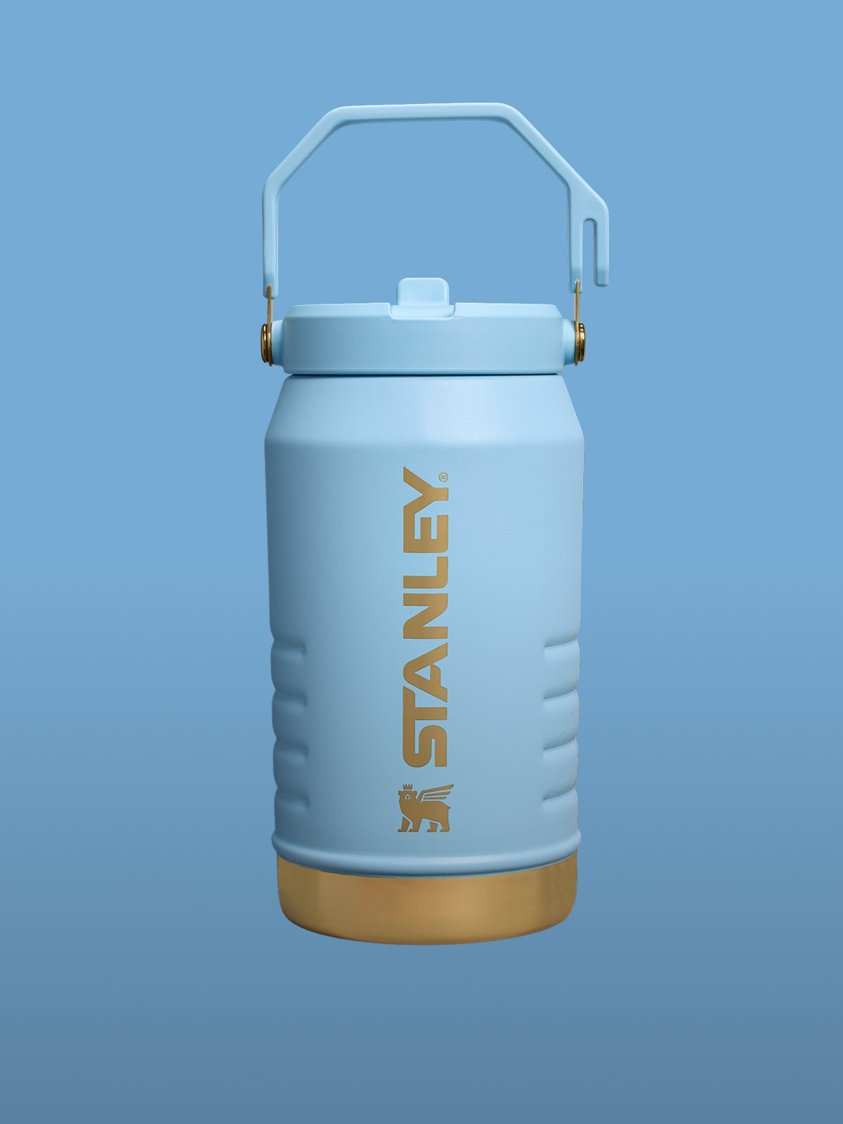 Blue Stanley insulated container with a handle on a blue background