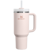 Stanley Rose Quartz Quencher with a straw on a white background
